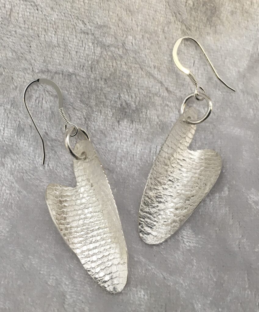 Solid silver textured with vintage lace